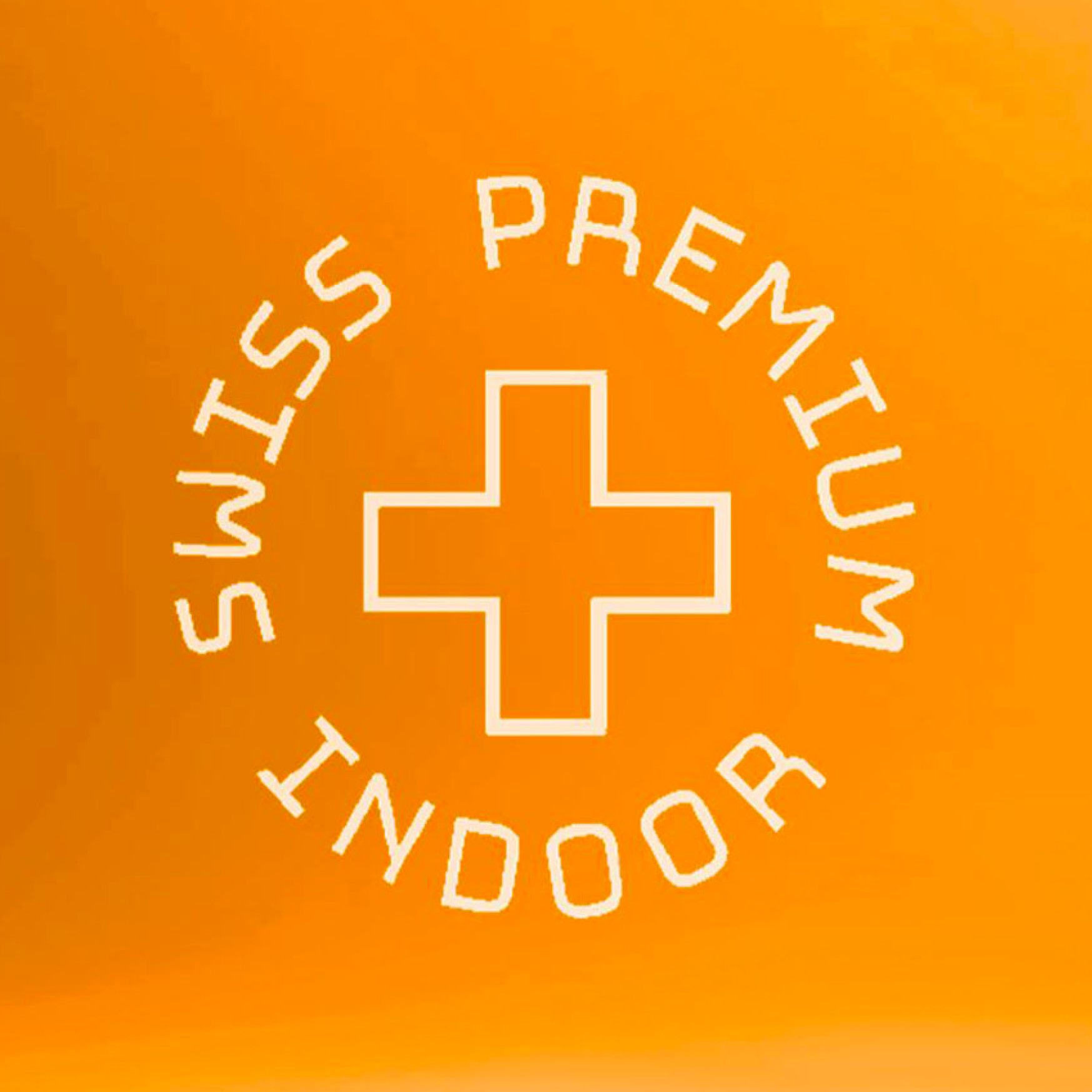 Ein oranges Design mit dem Text 'Swiss Premium Indoor' in einem Kreis, der ein Kreuz in der Mitte umgibt. Dieses Logo steht für hochwertige Indoor-Produkte aus der Schweiz.