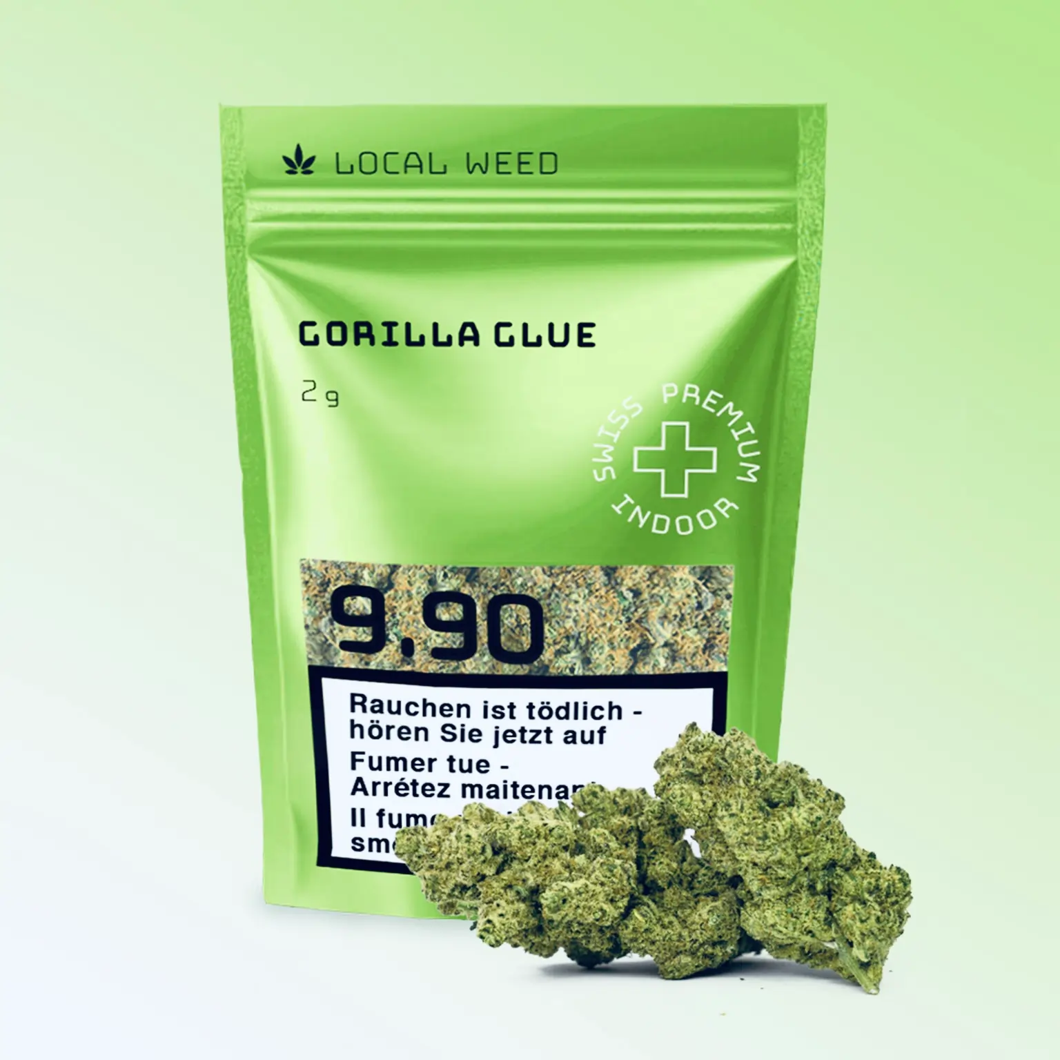 Die Local Weed Gorilla Glue 2g Packung in leuchtendem Grün steht für hochwertiges Swiss Premium Indoor CBD. Im Vordergrund liegen dichte, harzige Blüten, die für ihr intensives Aroma und ihre hohe Qualität bekannt sind.